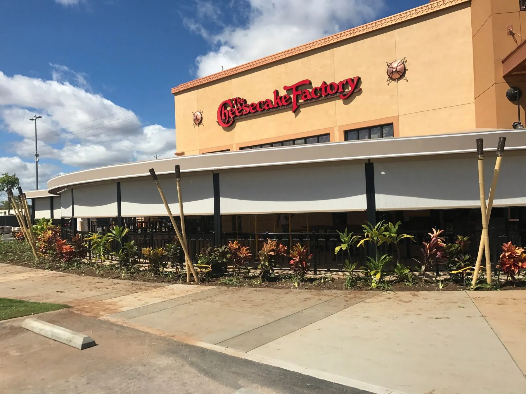 Large restaurant patio with wide white screens