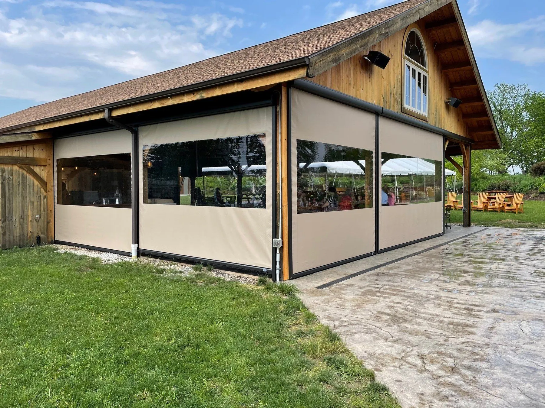 Winery event space fitted with large beige screens